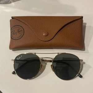 Polarized Raybans for sale with case. Little to no visible scratches on lenses.